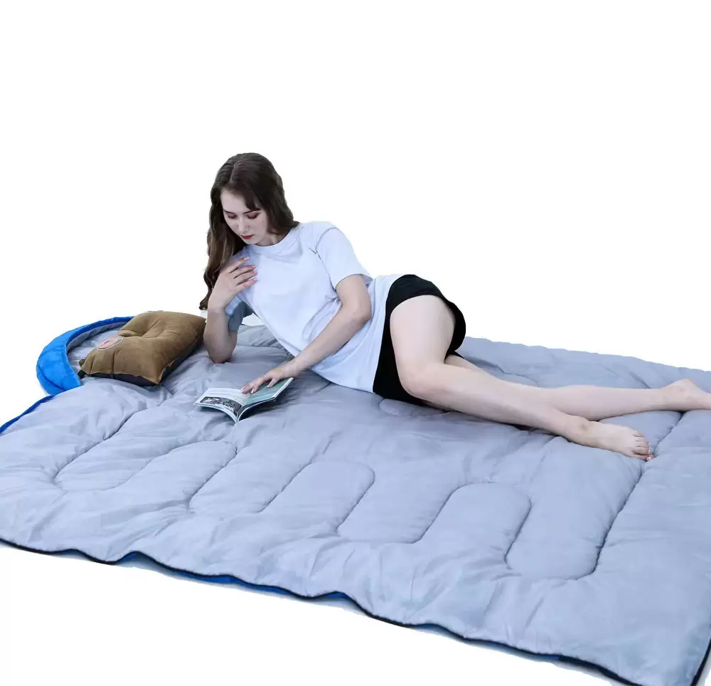 Colorblocked sleeping bag in medium green and medium blue