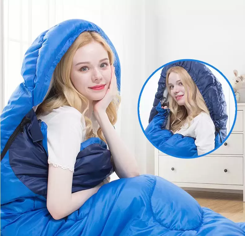 Colorblocked sleeping bag in medium green and medium blue