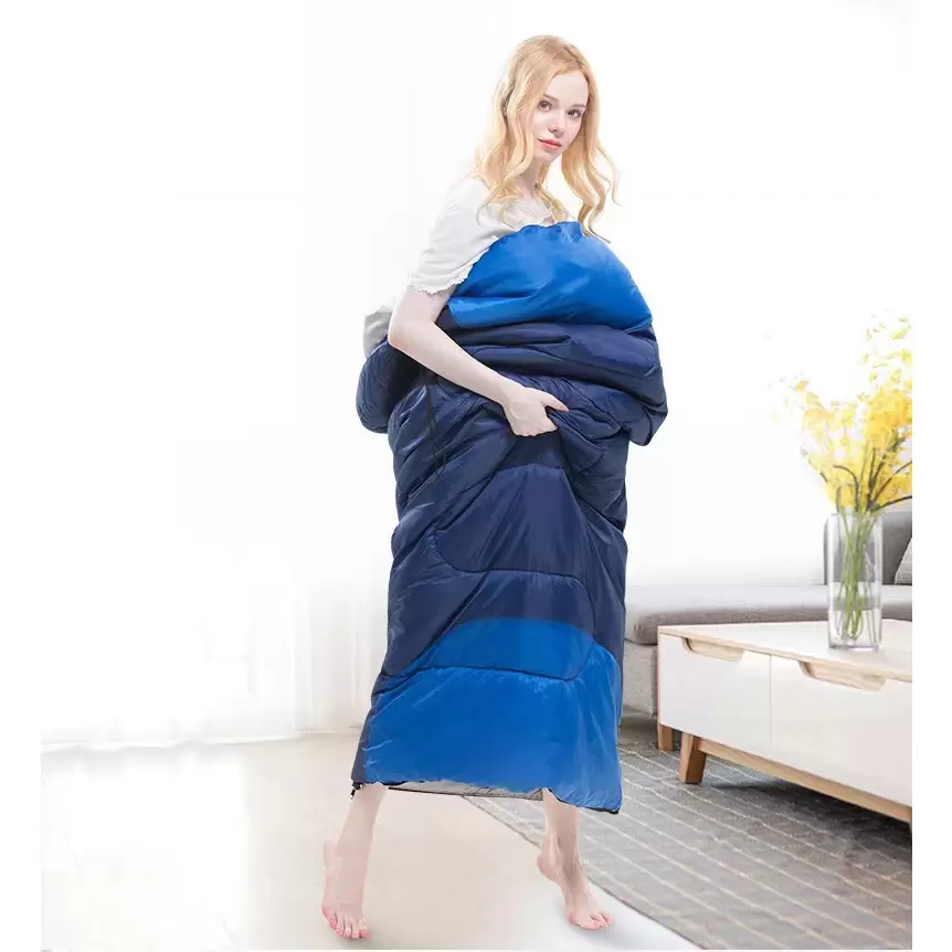 Colorblocked sleeping bag in medium green and medium blue