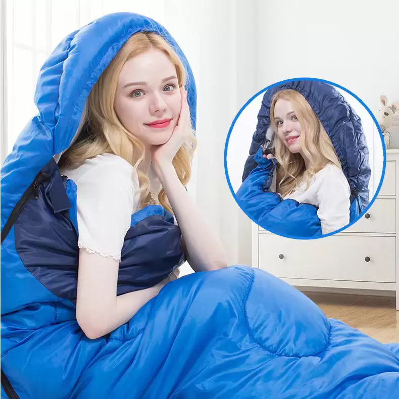 Colorblocked sleeping bag in medium green and medium blue