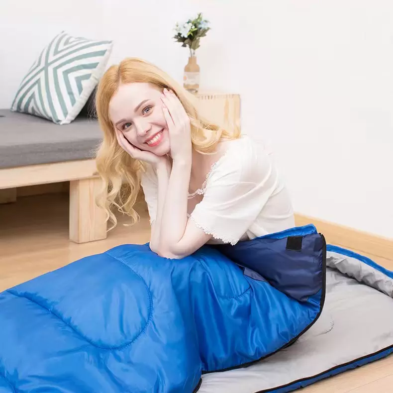 Colorblocked sleeping bag in medium green and medium blue